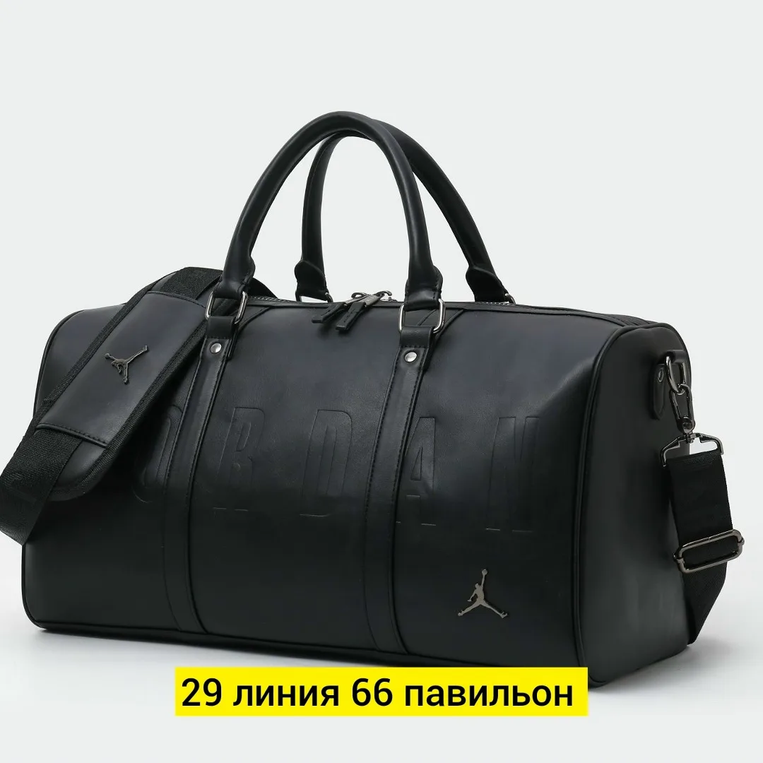 Дорожная сумка из эко-кожи с вместительным отделением — фото 9