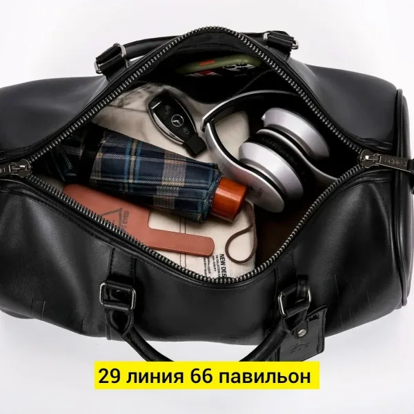 Дорожная сумка из эко-кожи с вместительным отделением — фото 1