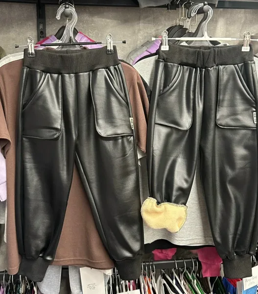 Брюки из натуральной кожи с меховым вставками — фото 2