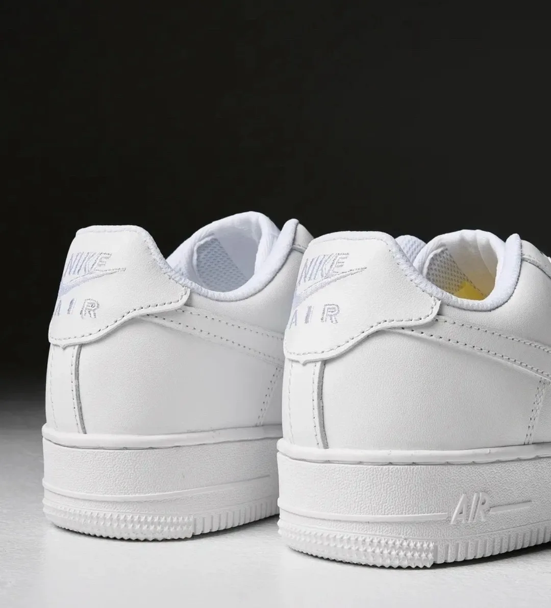 Кроссовки Nike Air Force 1 из белой кожаной ткани с надежной фиксацией шнурками — фото 2