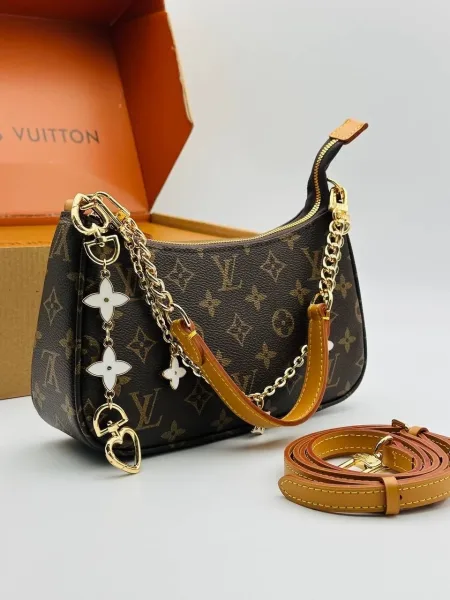 Louis Vuitton Сумка выполнена из натуральной канве — фото 2