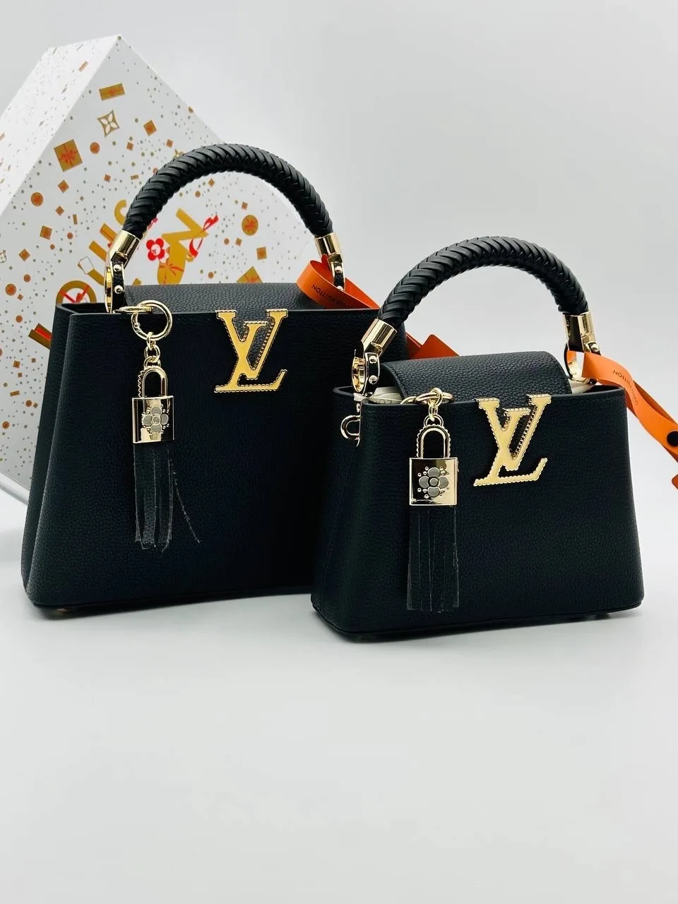 Сумка Capucines от Louis Vuitton выполнена из натуральной кожи — фото 5