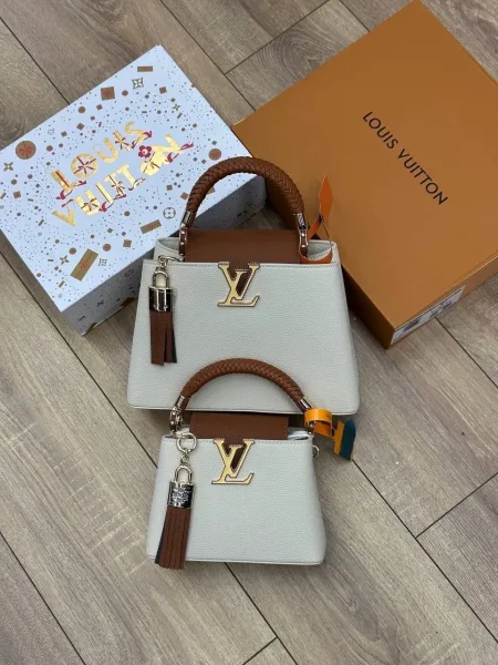 Сумка Capucines от Louis Vuitton выполнена из натуральной кожи — фото 1