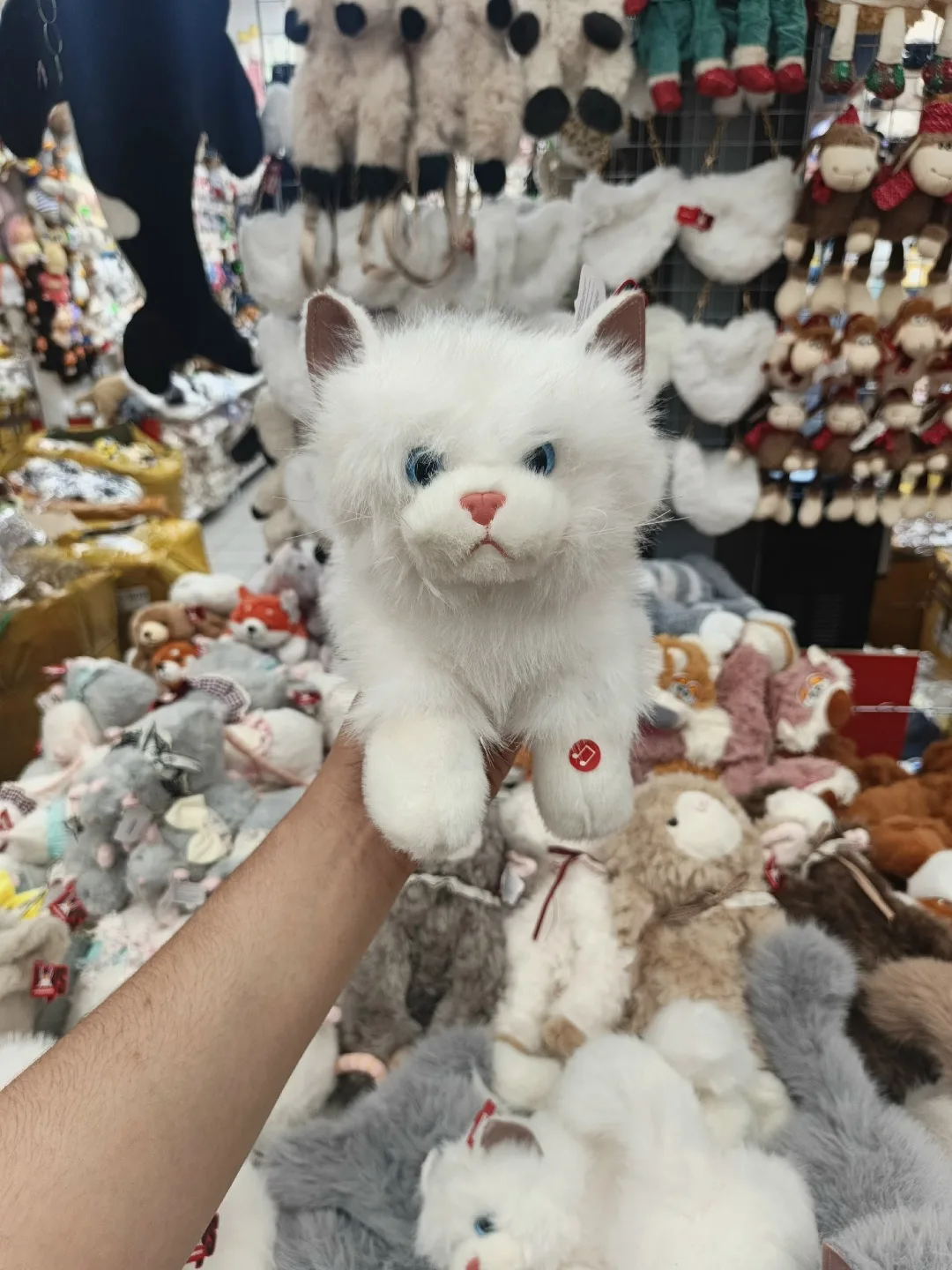 Музыкальная игрушка в форме кошки с шариками — фото 1