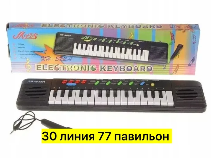 Игрушка-синтезатор из пластика с микрофоном, работает на батарейках — фото 5