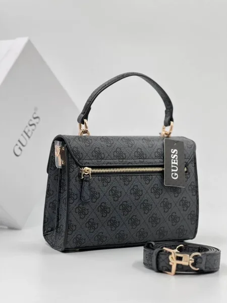 Женская сумка из эко кожи бренда Guess — фото 17