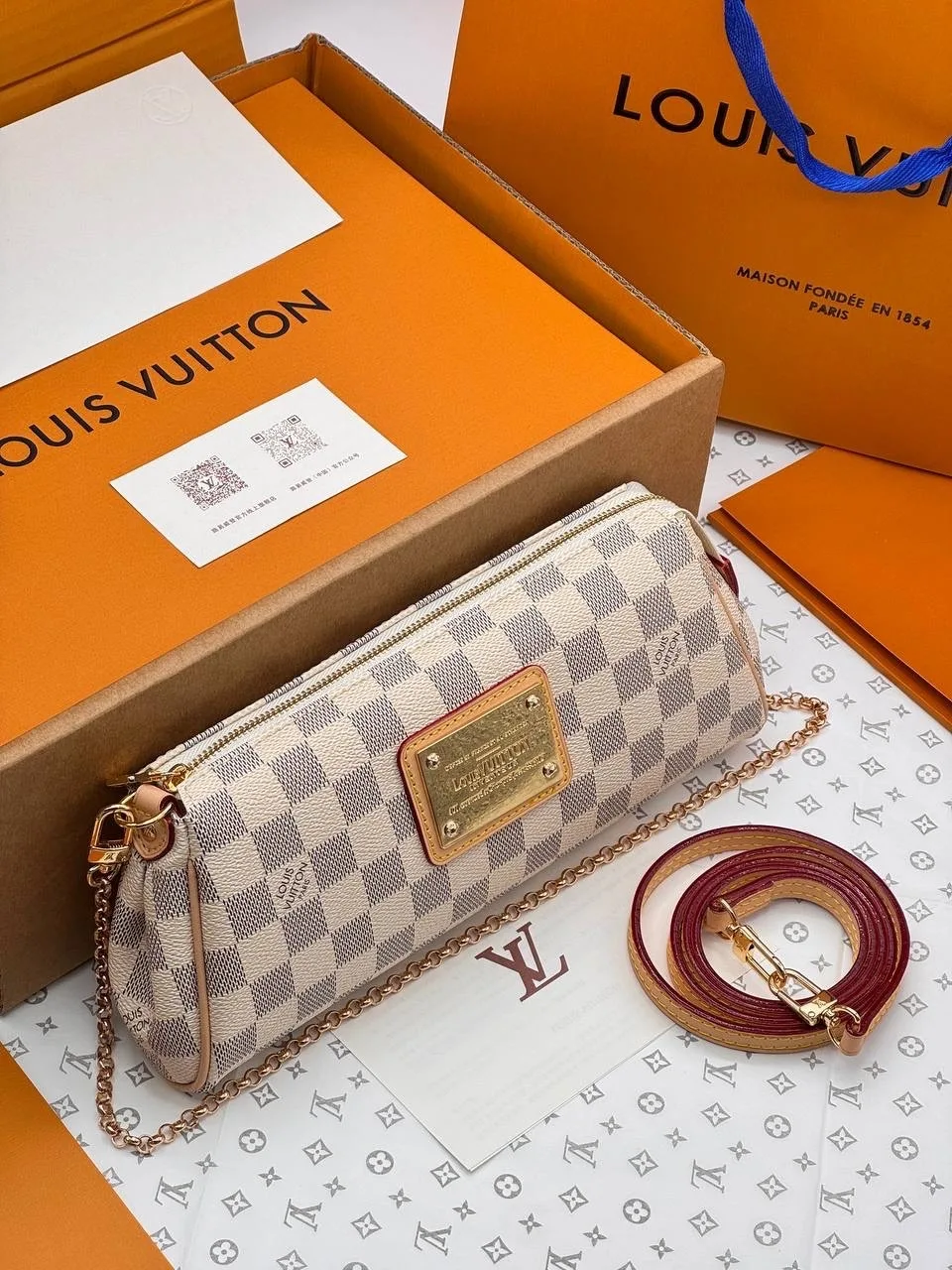 Сумка Louis Vuitton Eva Clutch — фото 1