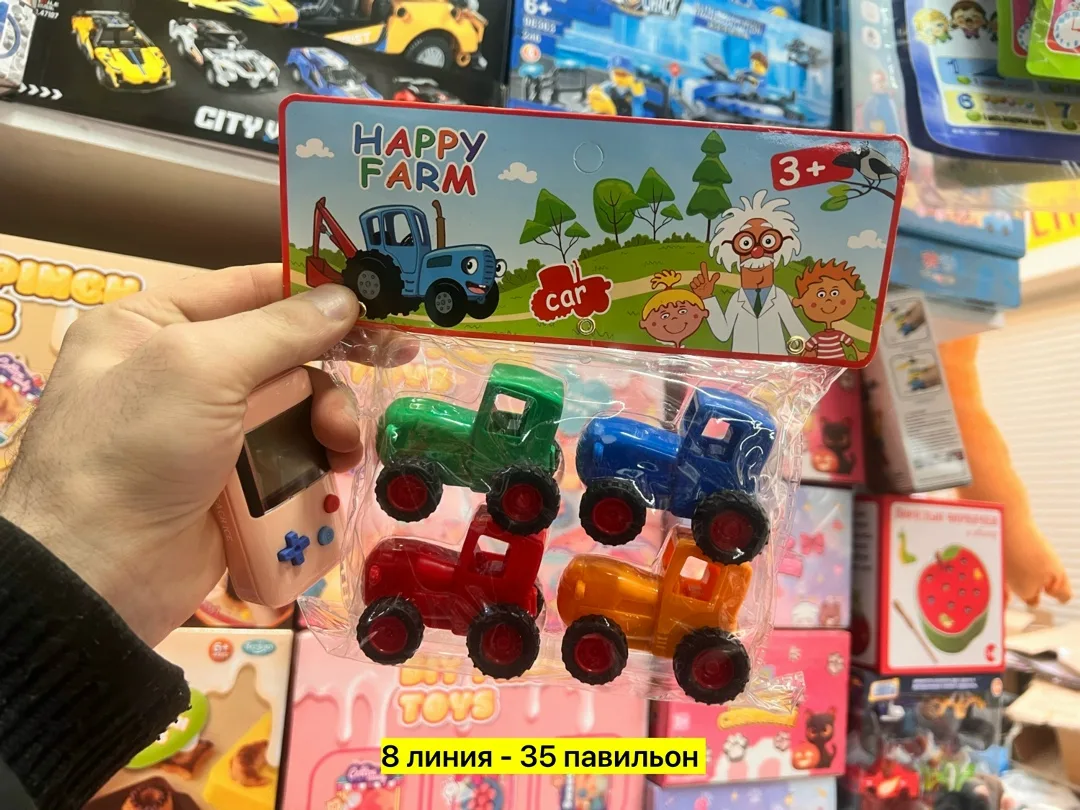 Игрушка из пластикового материала в виде синего трактора — фото 2