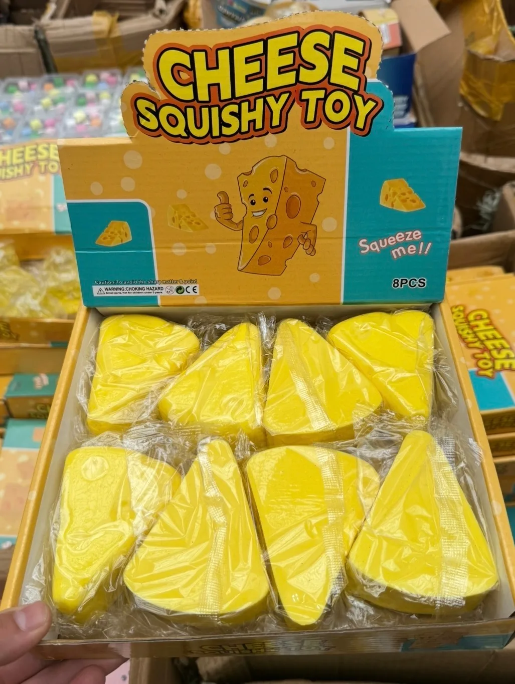 Мягкая силиконовая игрушка в форме треугольного сыра — фото 1