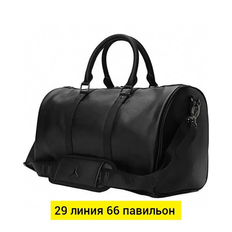 Дорожная сумка из эко-кожи с вместительным отделением — фото 1
