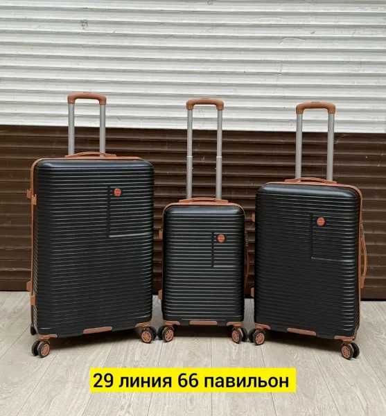 Набор из трёх чемоданов на 4 колёсах из прочного поликарбоната — фото 19