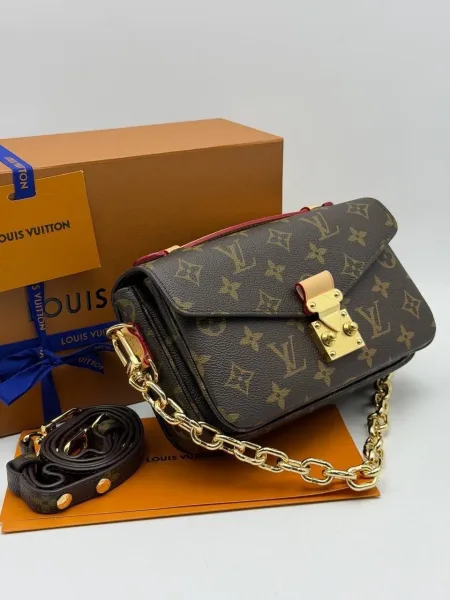 Сумка из натуральной кожи и канвы с дизайном Louis Vuitton — фото 2