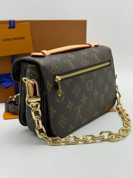 Сумка из натуральной кожи и канвы с дизайном Louis Vuitton — фото 3