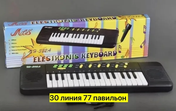 Игрушка-синтезатор из пластика с микрофоном, работает на батарейках — фото 3