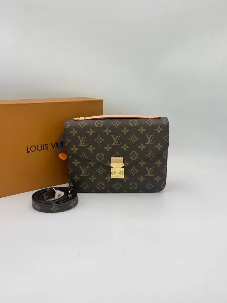 Сумка LOUIS VUITTON из канвы и натуральной кожи — фото 1