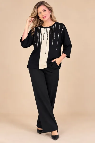 Женская кофточка свободного кроя с круглым вырезом и рукавом 3/4 — фото 5