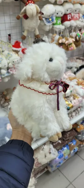 Милая пушистая мягкая игрушка — фото 8