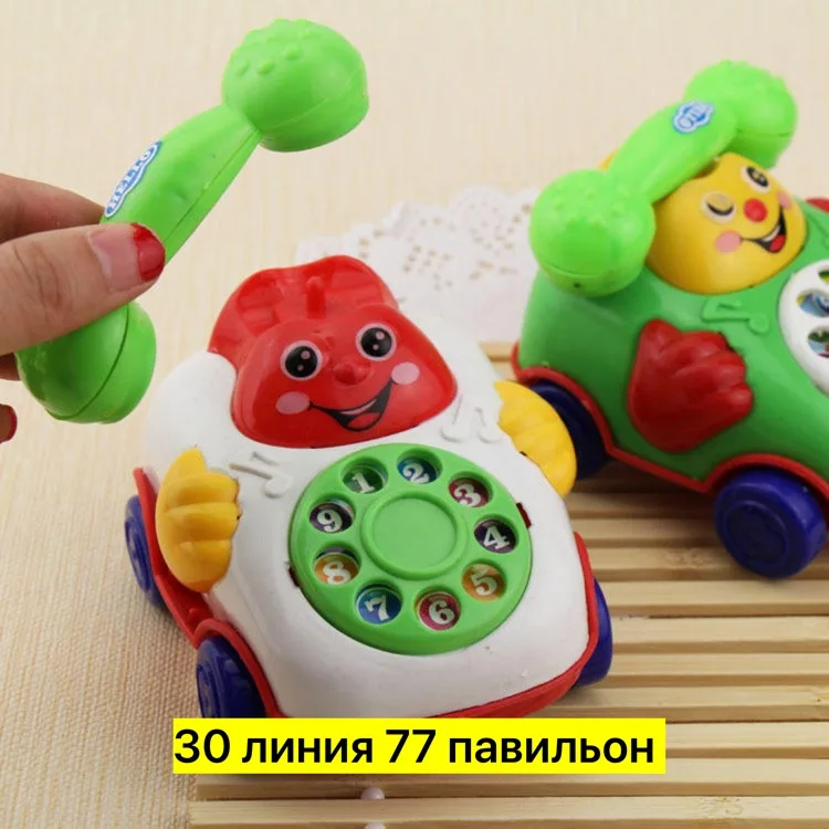 Игрушка из пластика с заводным механизмом и вращающимся циферблатом — фото 4