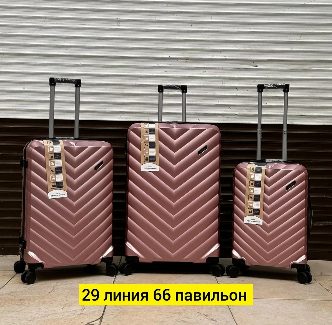 Набор из трёх чемоданов на 4 колёсах из прочного поликарбоната — фото 77