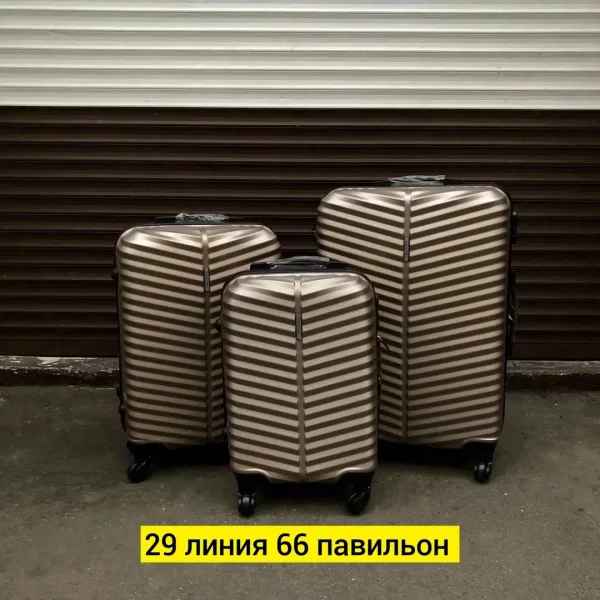 Набор из трёх чемоданов на 4 колёсах из прочного поликарбоната — фото 34