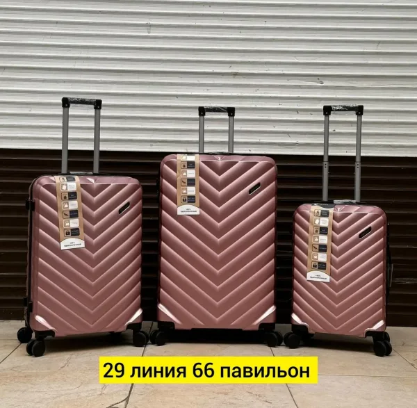 Набор из трёх чемоданов на 4 колёсах из прочного поликарбоната — фото 77