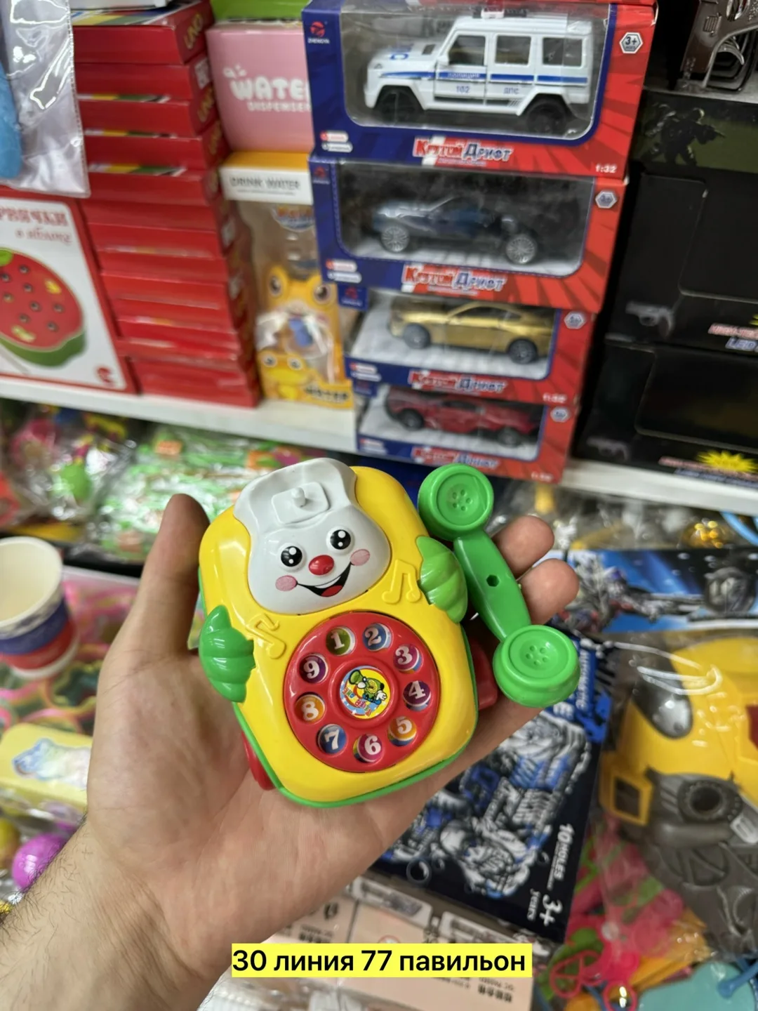 Игрушка из пластика с заводным механизмом и вращающимся Красный — фото 4