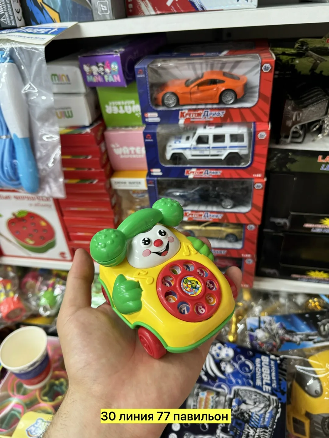 Игрушка из пластика с заводным механизмом и вращающимся Красный — фото 7