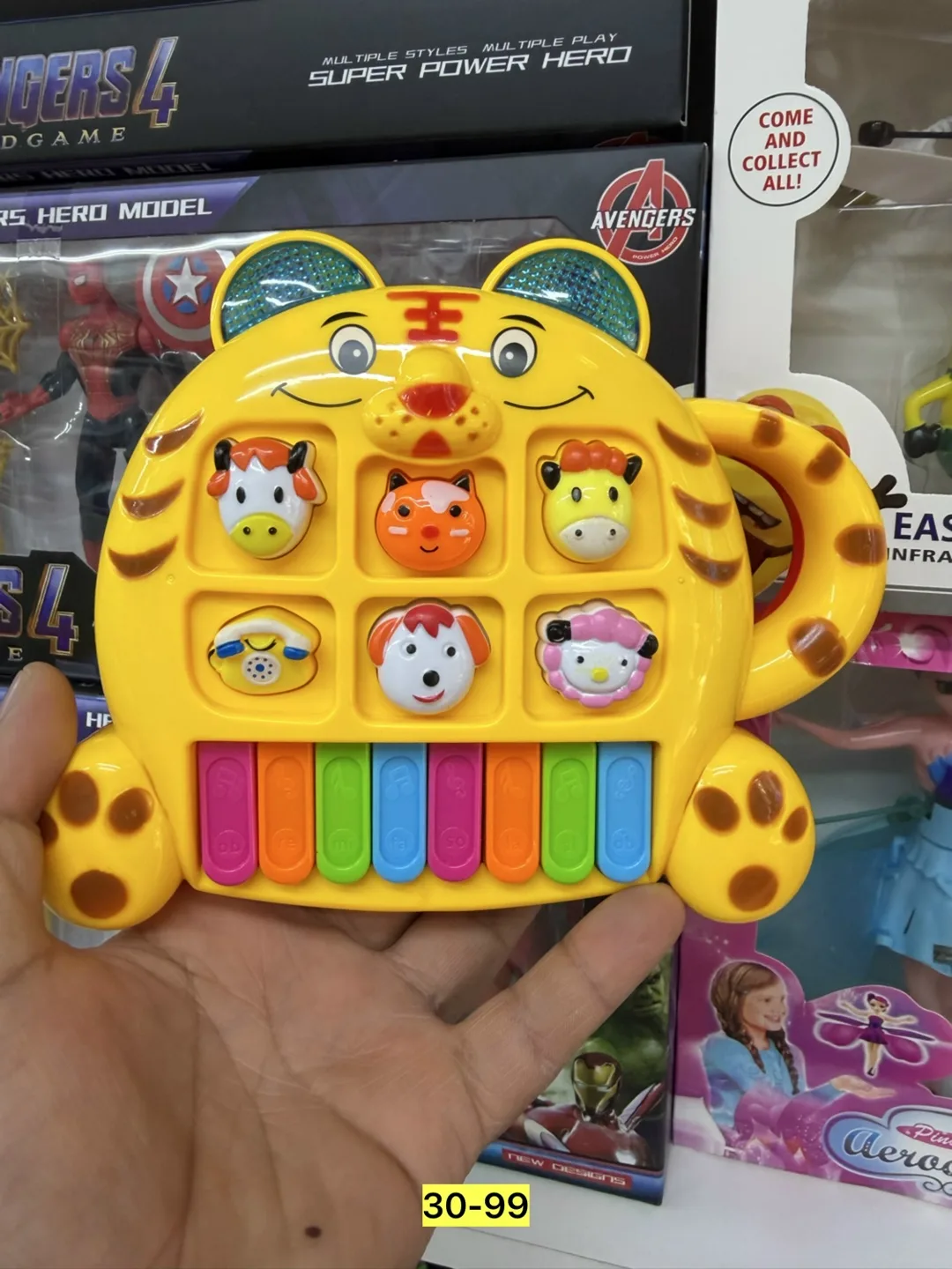 Музыкальная игрушка в форме тигрёнка из пластика — фото 1