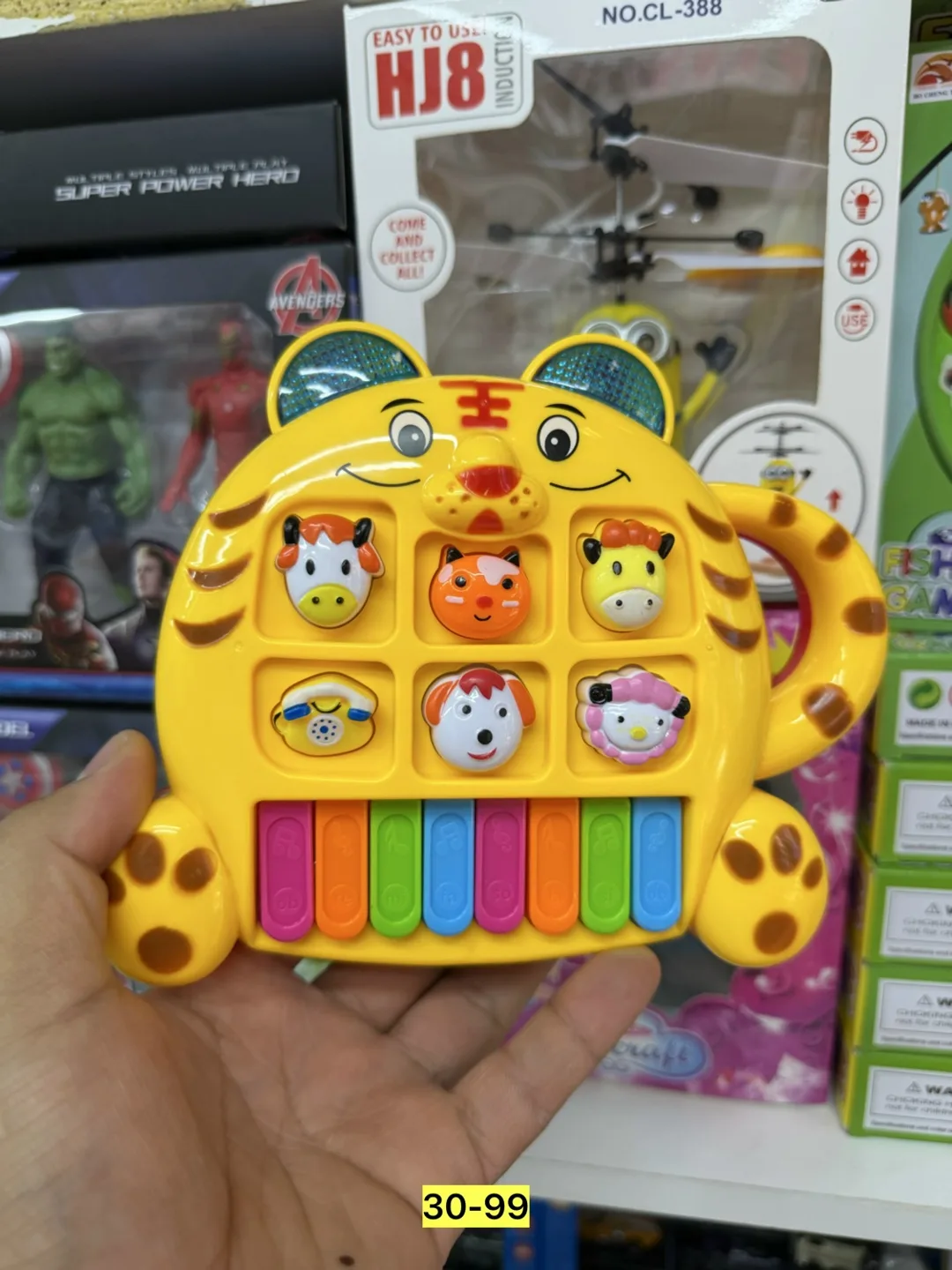 Музыкальная игрушка в форме тигрёнка из пластика — фото 7