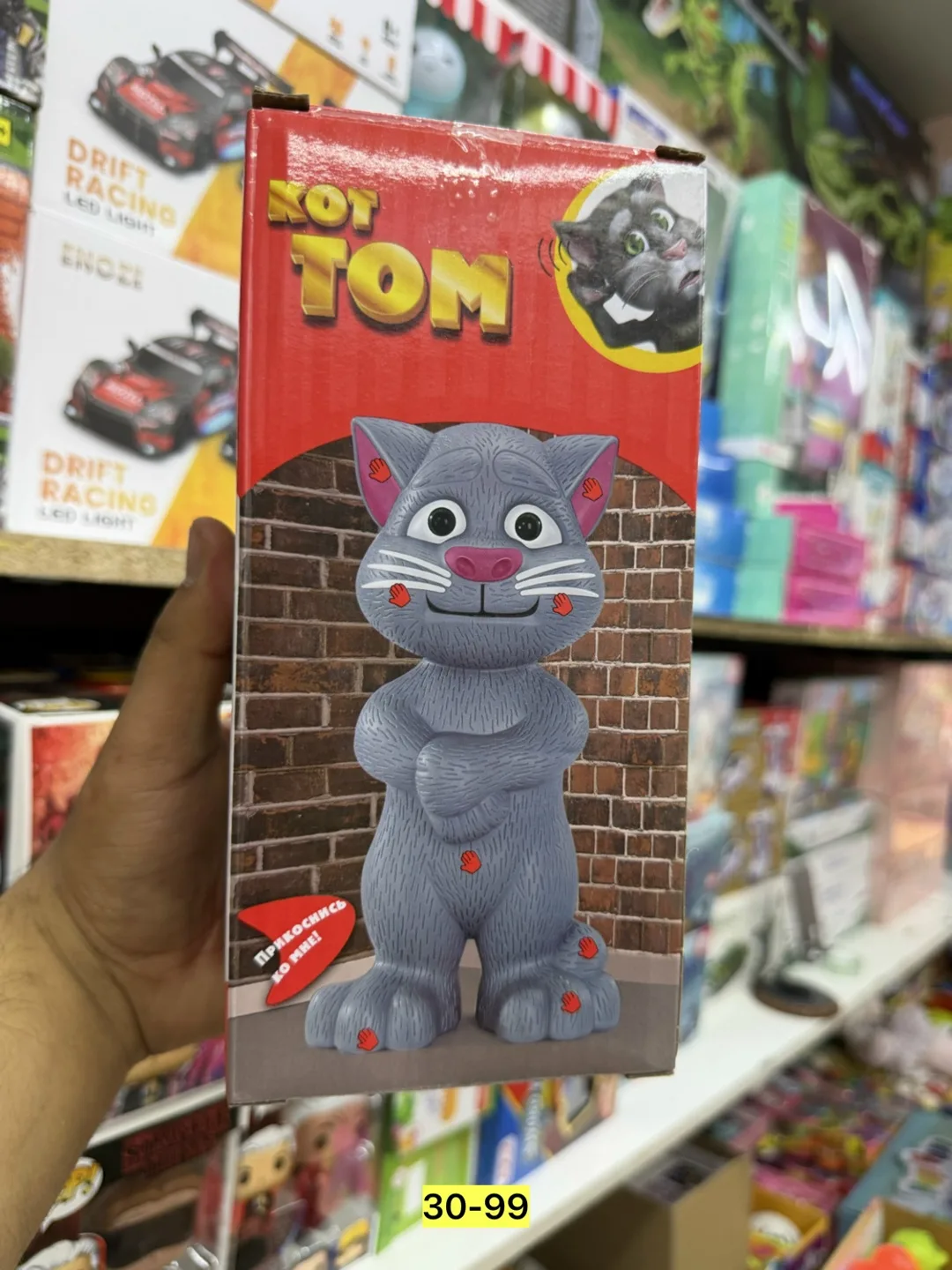 Говорящая игрушка в виде кота из пластика — фото 1